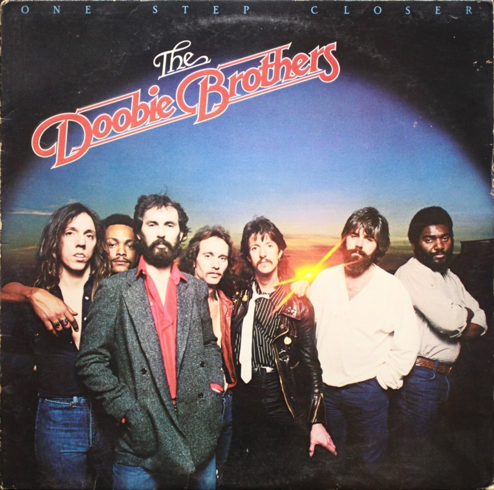 paroles The Doobie Brothers Keep This Train A-Rollin'